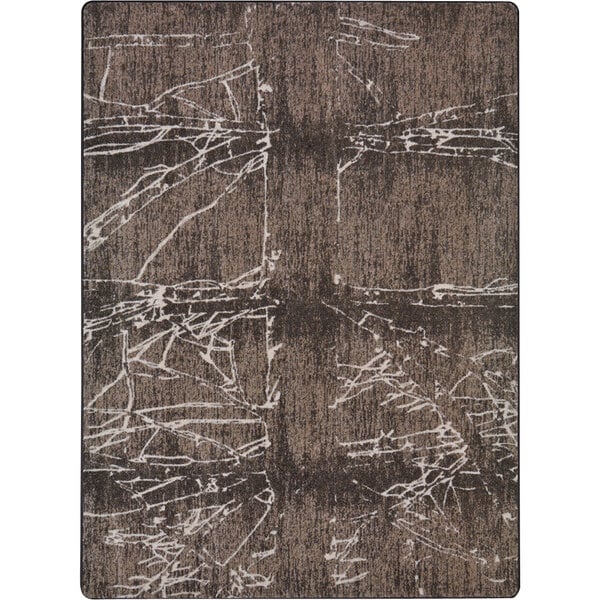 A Joy Carpets Umber area rug with abstract designs in brown and white, including a crack in the middle.