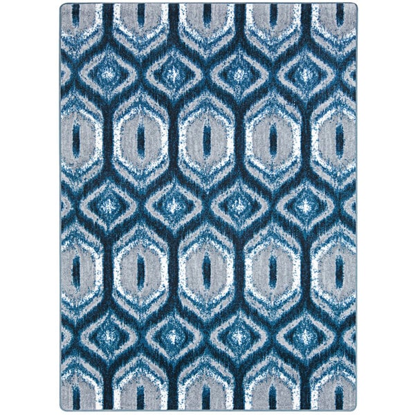 A peacock blue rug with geometric patterns.