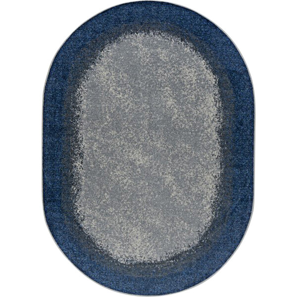 A white oval area rug with a blue border.