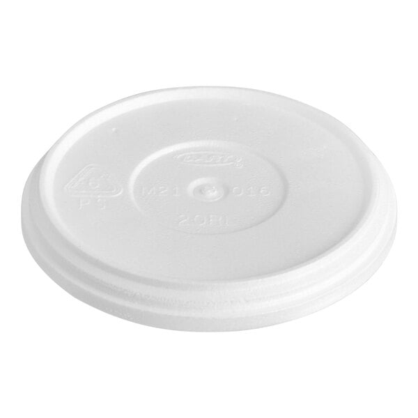 A Dart white foam plastic lid with a circle and numbers on a white surface.