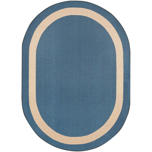 A blue and white oval rug with a white border.