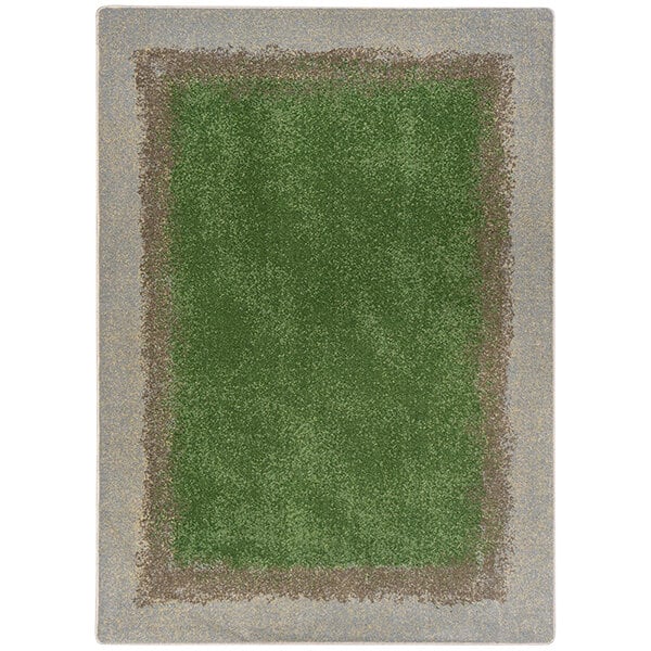 A white area rug with a green border and green and brown stripes.