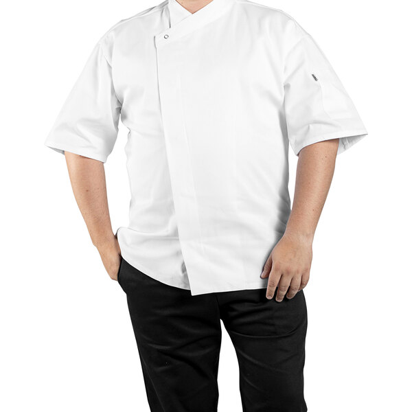 A man wearing a white Uncommon Chef Calypso chef coat with a mesh back.