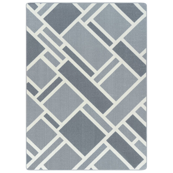 A close-up of a grey and white diamond pattern on a Joy Carpets rectangular area rug.