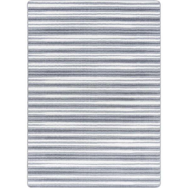 A Joy Carpets Claremont Kids Between the Lines area rug with gray and white stripes and a white border.