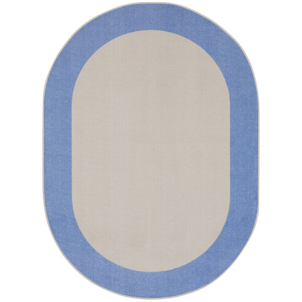 A light blue oval rug with white border and blue accents.