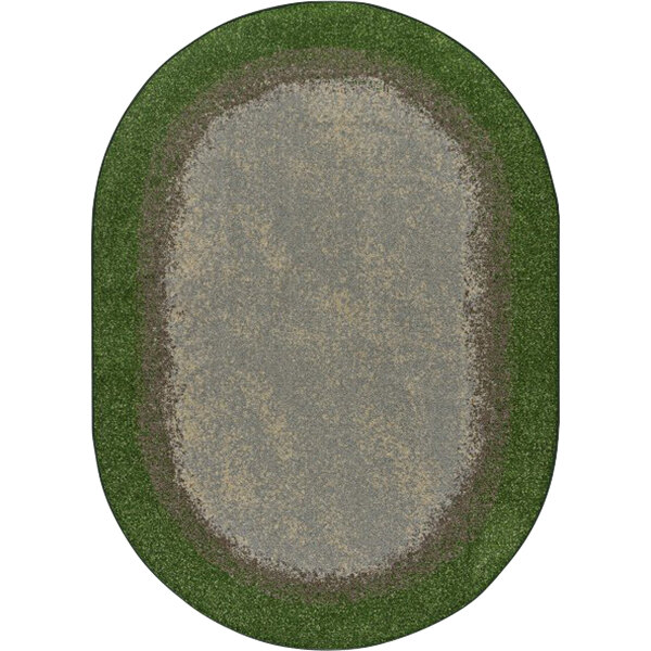 A white oval area rug with a green border and grass design.