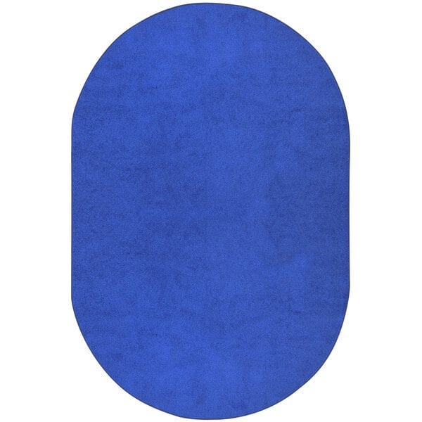 A blue oval rug with white accents.