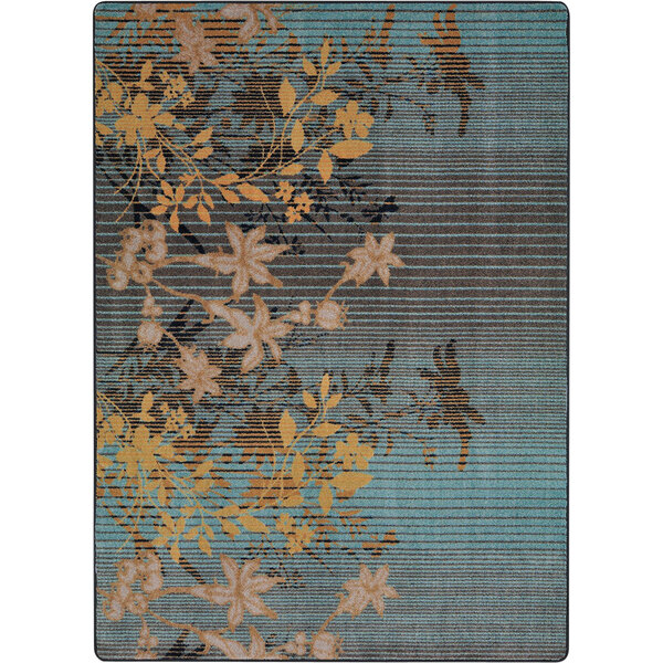 A Joy Carpets Peaceful Garden lagoon rectangular area rug with blue and yellow flowers on it.