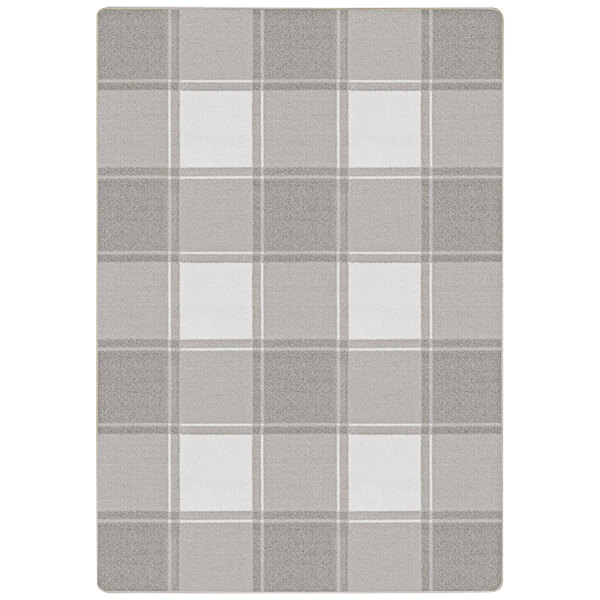 A grey and white plaid Joy Carpets area rug with a white border.