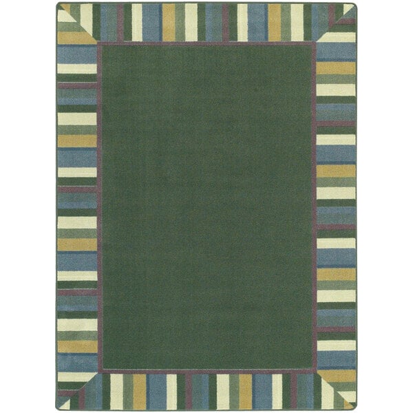 A green area rug with a border and colorful stripes.