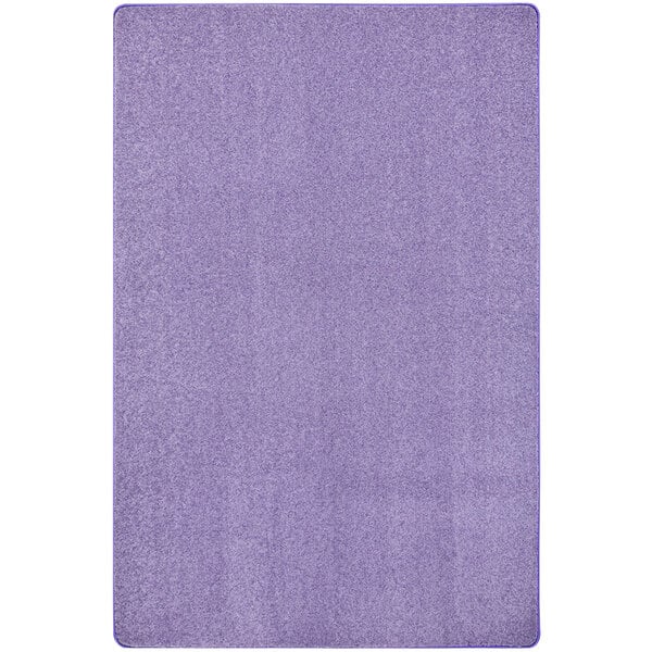 A purple rectangular rug with a white border.
