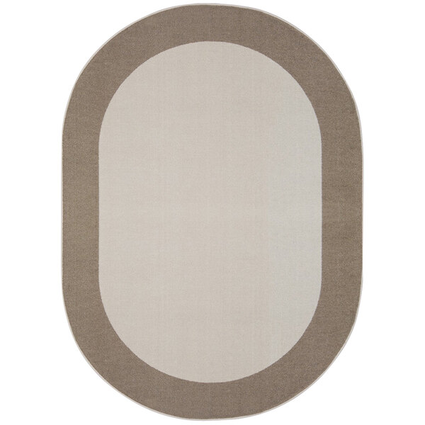 A neutral oval rug with a white border.