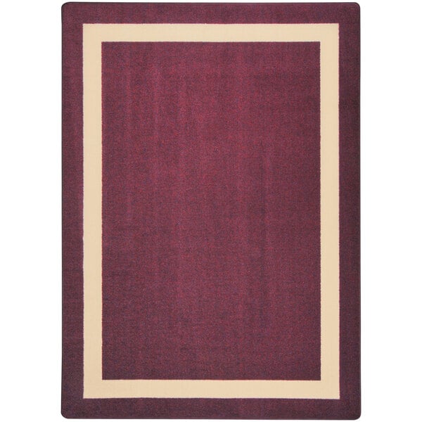 A Joy Carpets rectangular area rug with a burgundy and beige border on a white background.