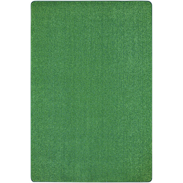 A grass green rectangular area rug with white accents.