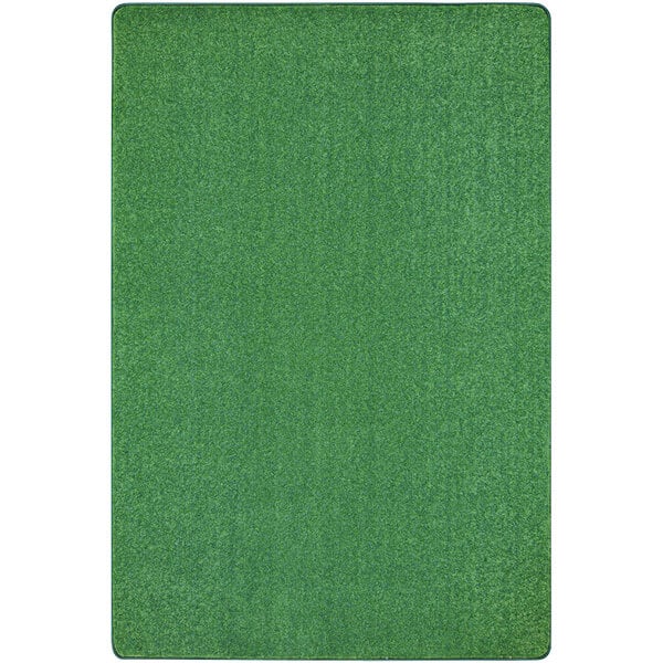 A grass green rectangle area rug with white accents.