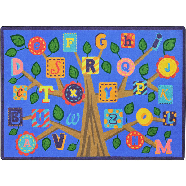 A white rectangle area rug with colorful leaves and letters on it.