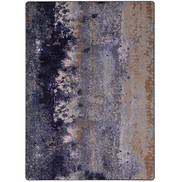 A close-up of a Joy Carpets First Take Amethyst area rug with a blue and grey design.