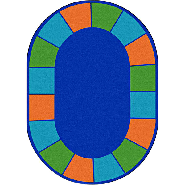 A blue oval rug with colorful squares.
