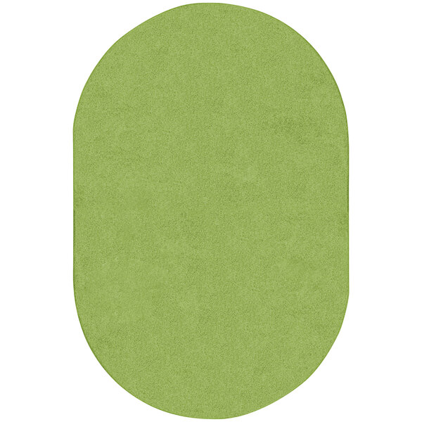 A lime green oval shaped area rug.