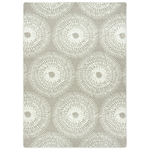 A Joy Carpets linen rectangular area rug with a white background and a circular grey and white pattern.