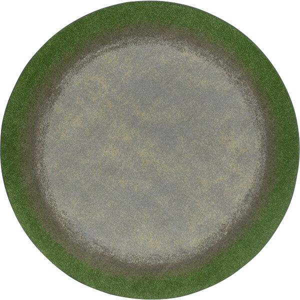 A round green and grey area rug with a design of meadow flowers.