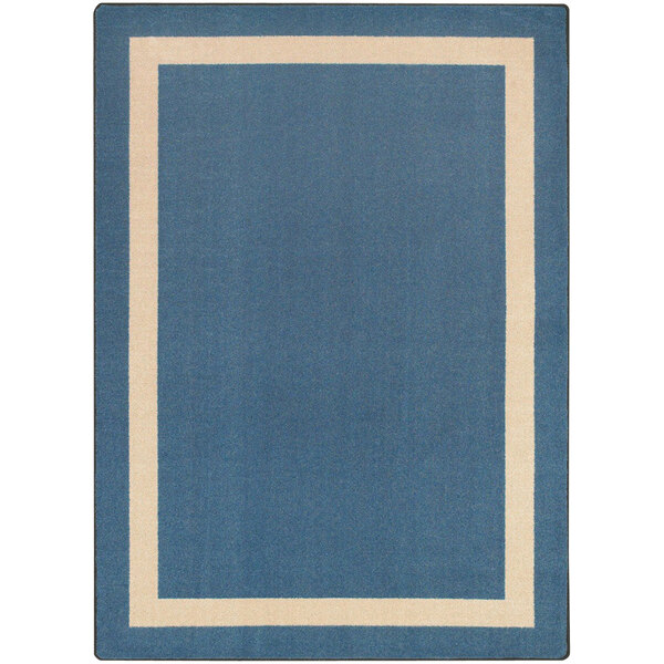 A blue rectangular rug with a beige border.
