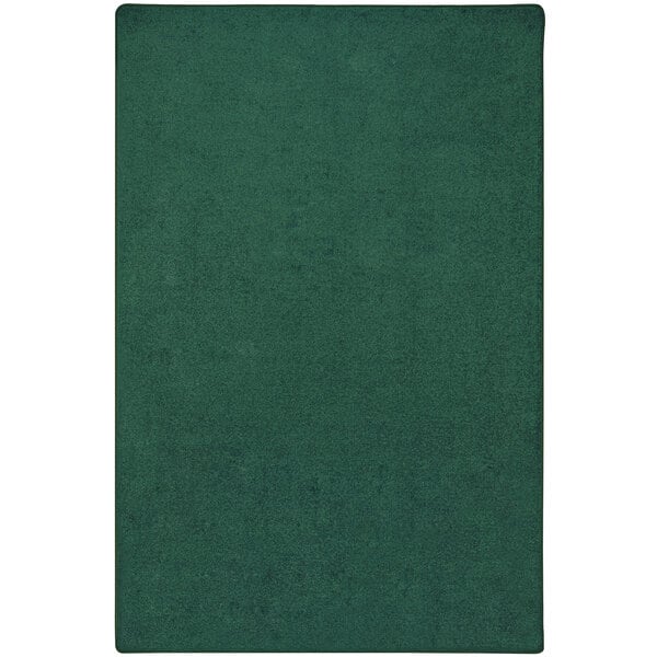 A forest green rectangle Joy Carpets Kid Essentials Endurance area rug.