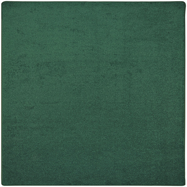 A green square Joy Carpets Kid Essentials Endurance area rug.