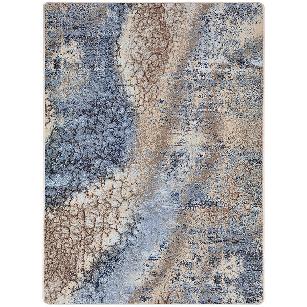 A close up of a blue and beige Joy Carpets Solitude area rug with a pattern.