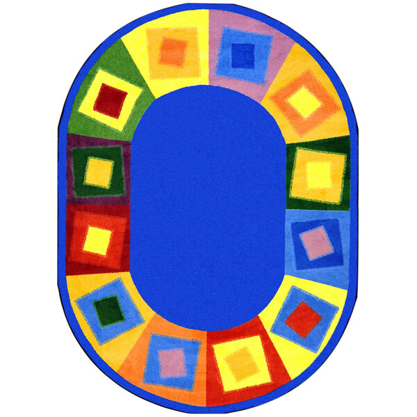 A colorful oval rug with a bright design including squares and a border of yellow, blue, and red.