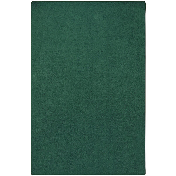 A Joy Carpets Kid Essentials Forest green rectangle area rug.