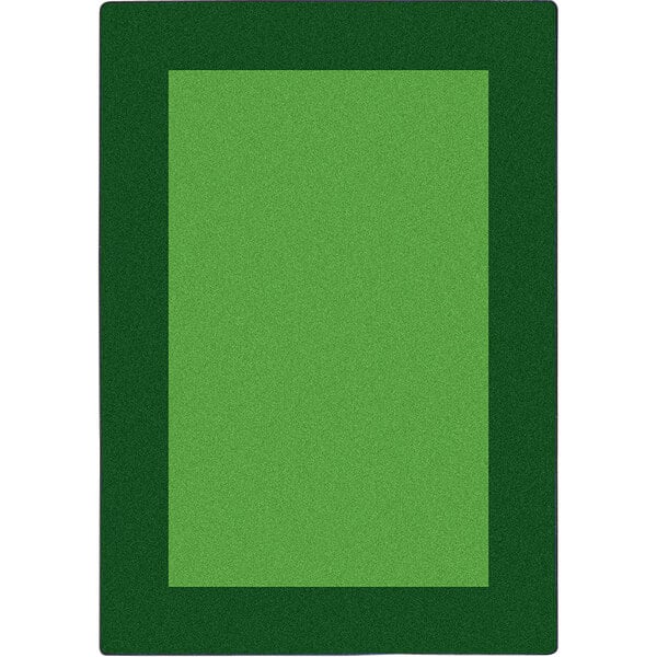 A green rectangular rug with a black border.