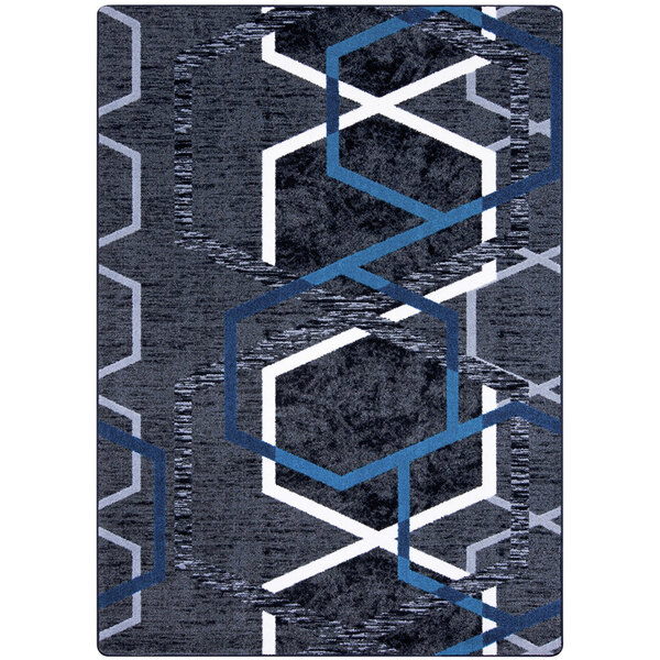 A Joy Carpets rectangular area rug with blue and grey hexagons on it.