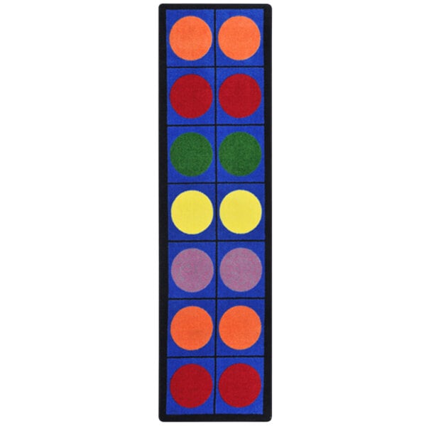 A multicolored runner with blue and yellow circles on a blue background.