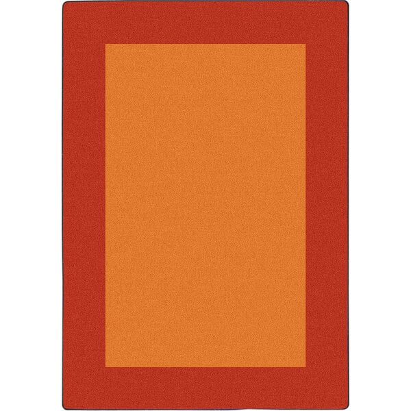 An orange rectangle area rug with a red border and a rectangle in the middle.