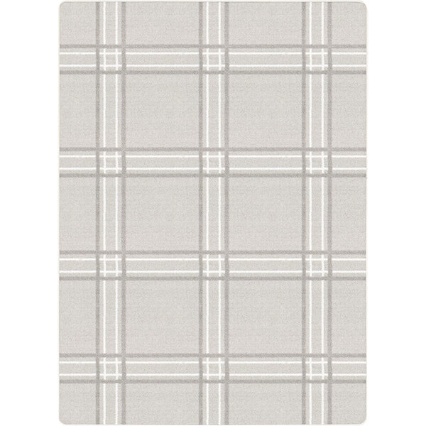 A white and grey plaid rectangle area rug.