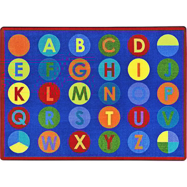 A white, blue, and multi-colored rectangle area rug with letters and numbers on it.