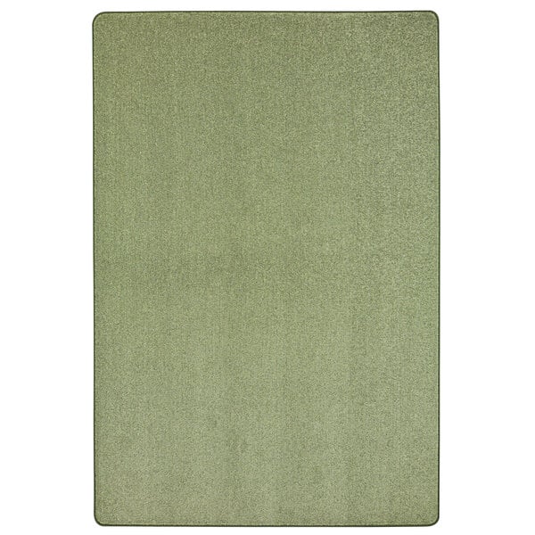 A close-up of a sage green rectangular area rug.