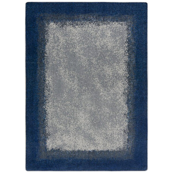 A blue and gray rectangular area rug with a square border.