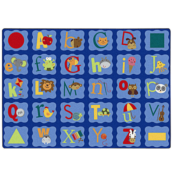 A white area rug with blue letters and animals on it.