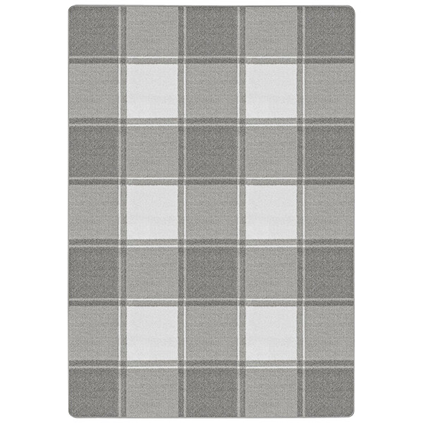 A grey and white plaid Joy Carpets Impressions area rug with a white border.