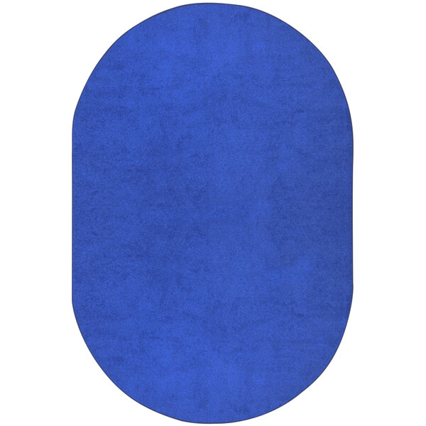 A royal blue oval area rug.