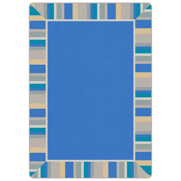 A light blue rectangular area rug with a blue border and white rectangles.