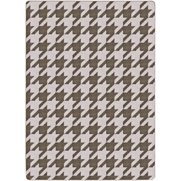 A white rug with brown hounds tooth pattern.