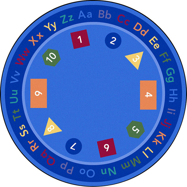 A multi-colored round rug with colorful letters and numbers on a blue background.