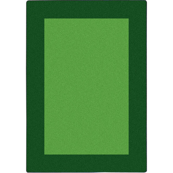 A green rectangular rug with a black border.