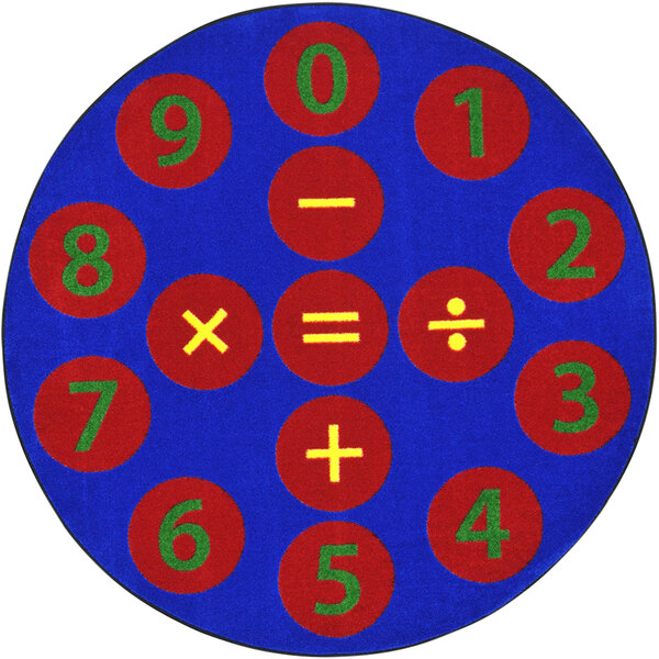 A multicolored circular rug with numbers and symbols on it.