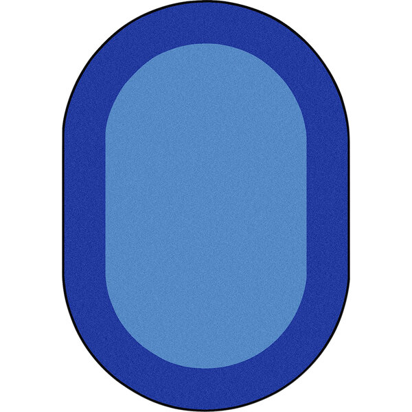 A blue oval shaped rug with a white border.