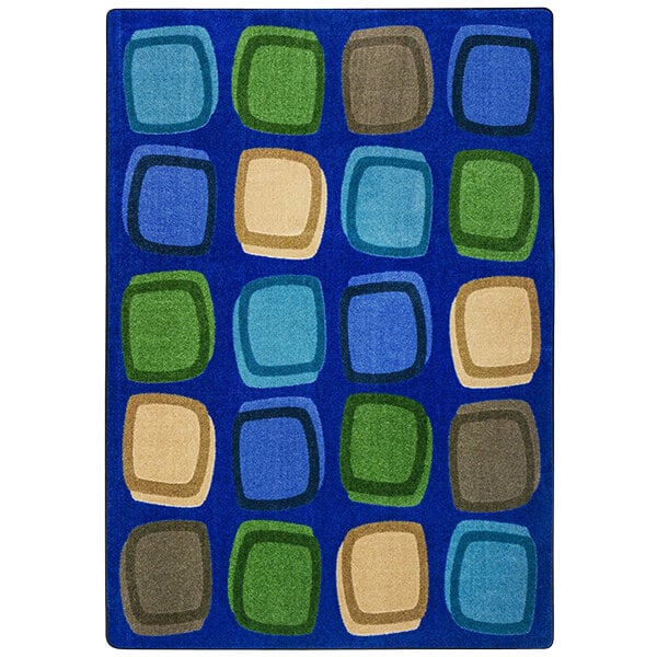A blue rectangular area rug with squares in different colors.